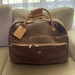 Classy carry on luggage. Has wheels and expands easily